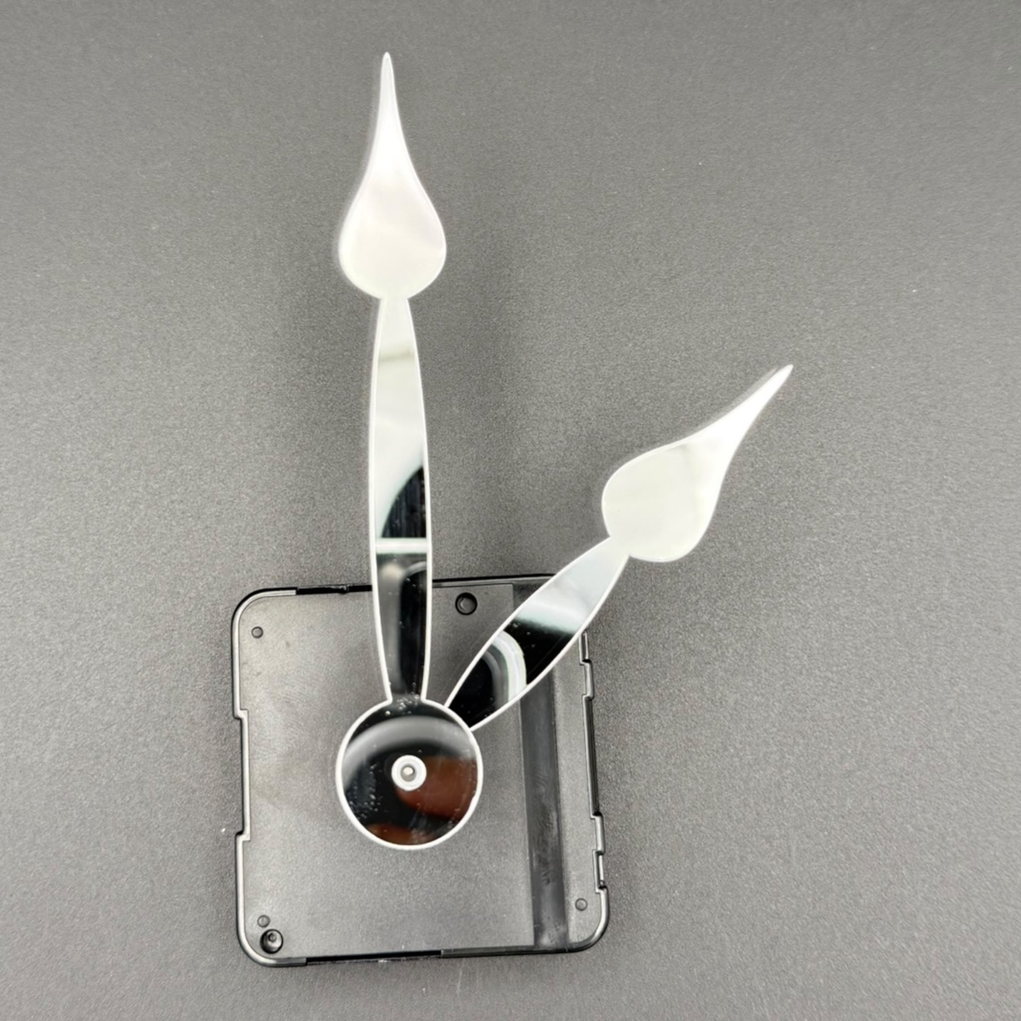 Clock hands "spring" made of mirror acrylic