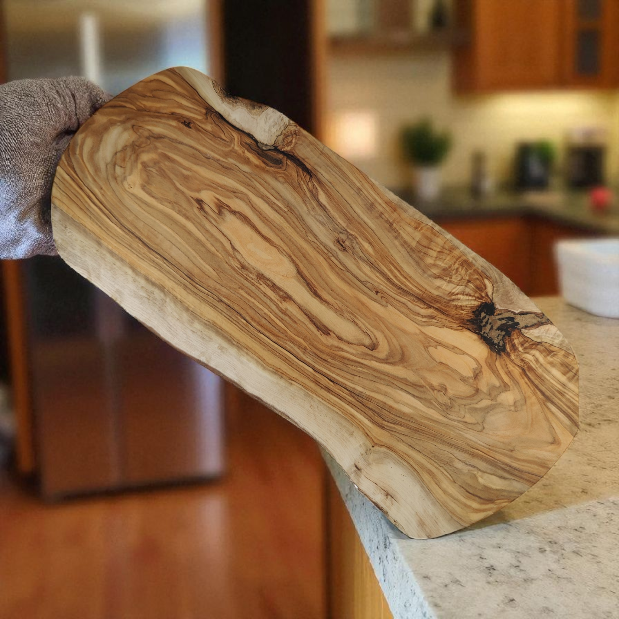 Olive wood board with rustic edge